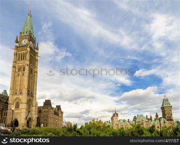 Parliament Hill in Ottawa, Canada. Peace Tower and East Block of Canadian Parliamentary complex in autumn