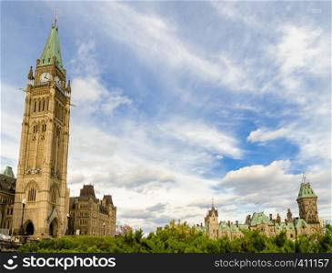 Parliament Hill in Ottawa, Canada. Peace Tower and East Block of Canadian Parliamentary complex in autumn