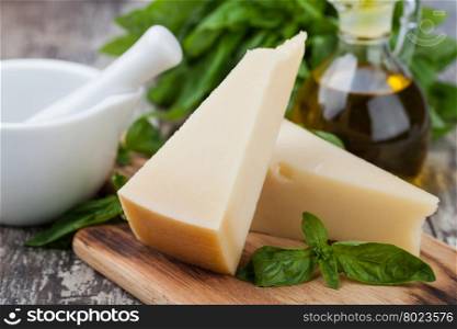 parmesan cheese. parmesan cheese on wooden background