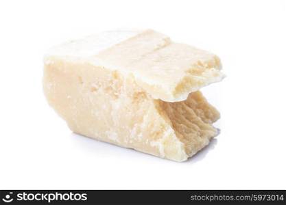 Parmesan cheese part isolated on white background. The Parmesan cheese