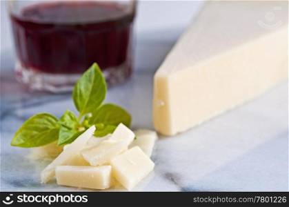 parmesan cheese with basil and red wine. parmesan cheese