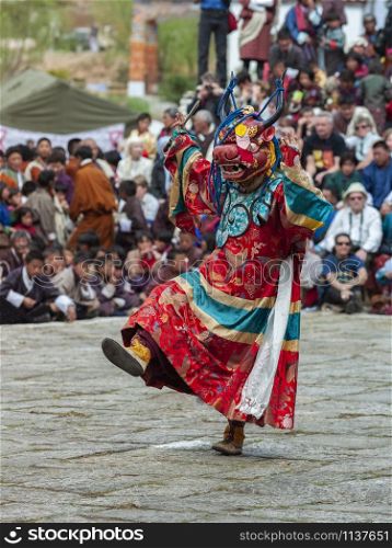 Paro. Bhutan. 03.22.05. Mask Dance at Paro Tsechu in the Kingdom of Bhutan. Tshechus are religious festivals of the Drukpa Lineage of the Kagyu school of Tibetan Buddhism.