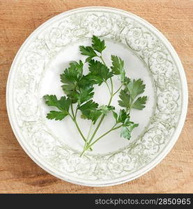 Parsley on a wooden surface