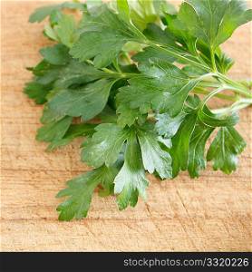 Parsley on a wooden surface
