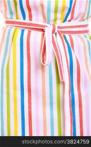 Part closeup of colorful striped kitchen apron as background. Housewife or chef barista entrepreneur.