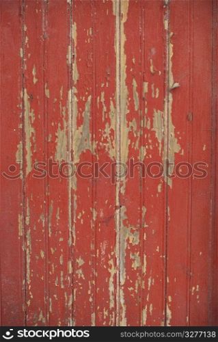 Part of a old woodboard texture painted on red.