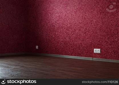 part of empty red room for rent or sale