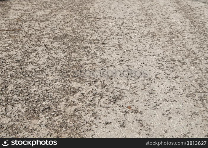Part of old asphalt road surface closeup as background