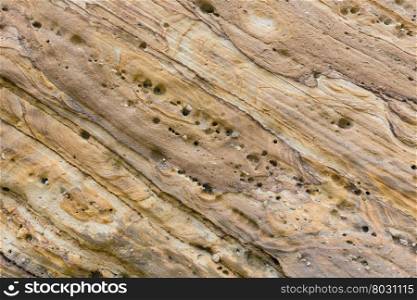 Part of stratiform rock close up. Nature background.