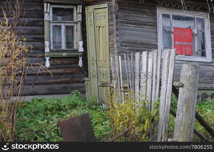 Part of the abandoned village house in Central Russia