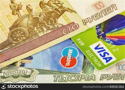 Part of the bank card cashless systems platezhnyhy Visa and Master Card and parts of Russian rubles banknotes