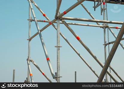 Part of the construction scaffold with blue background