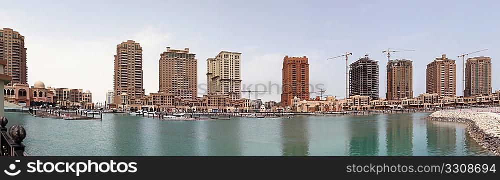 Part of The Pearl luxury complex on an artificial island in West Bay, Doha, Qatar, nearing completion in March 2010. The expensive apartments are aimed at expatriates who want to own property in the Arabian Gulf tax haven.