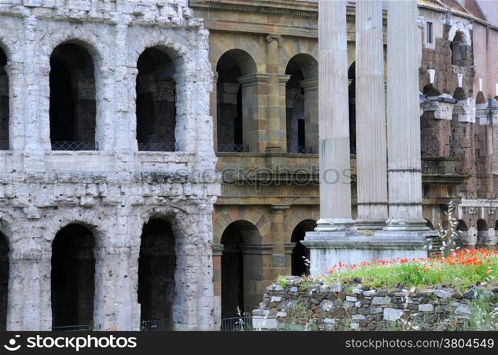 Part of the Theater of Marcellus and columns in Rome, Italy. The Theater used to be a temple and a fortress in various periods of its history