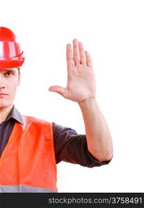Part of young man construction worker builder foreman in orange safety vest and red hard hat showing stop sign hand gesture isolated on white. No entry- safety in industrial work. Studio shot.