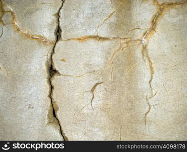 Partialy broken and cracked plaster wallpaper texture.