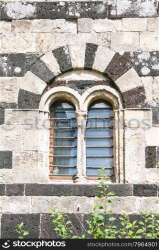 "Particular of window in a church of "San Pietro di Sorres" Borutta Sassari - Romanesque Church"