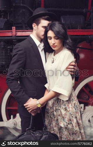parting of lovely couple on railway station
