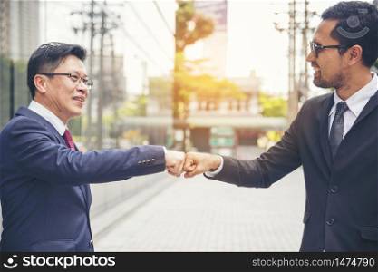 Partner Business Trust Teamwork Partnership. Industry contractor fist bump dealing mission business. Mission team meeting group of People Fist bump Hands together. Business trust teamwork Concept