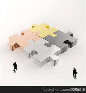Partnership Puzzle metal 3d and businessman icons as concept