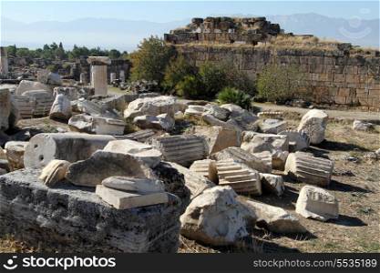 Parts of marble columns and ruins of temple in Hyerapolis, Turkey