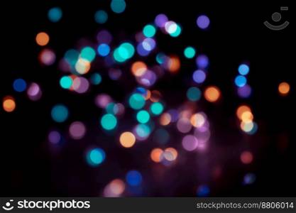 Party bokeh background, colorful blurry lights on New Year night, glowing festoon, beautiful holidays background, Christmas tree lights
