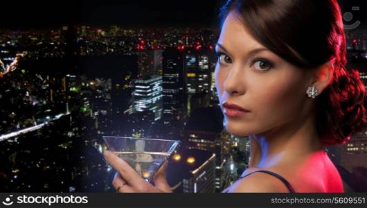 party, celebration, holiday and people concept - beautiful woman in evening dress with cocktail