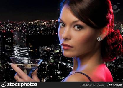 party, celebration, holiday and people concept - beautiful woman in evening dress with cocktail