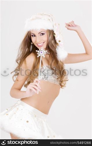 party dancer girl with magic wand in santa helper costume