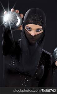 party dancer in ninja dress with disco balls
