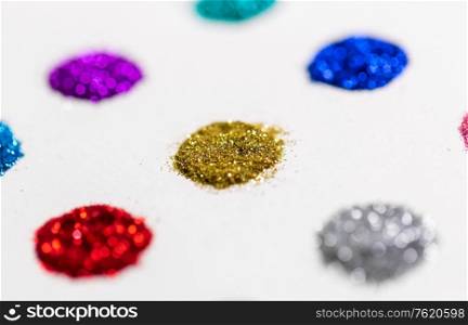 party, decoration and holidays concept - set of different color glitters on white background. set of glitters on white background