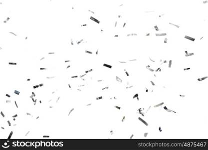 party, decoration and holidays concept - silver confetti over white background