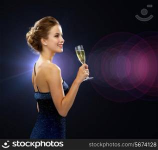party, drinks, holidays, luxury and celebration concept - smiling woman in evening dress with glass of sparkling wine over night lights background