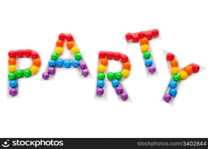 Party letter trays filled with a rainbow of colorful bubble gum. Shot on white background.