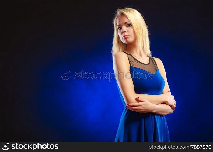 Party, new year, celebration, disco concept - Portrait attractive fashion woman, blonde long hair girl in evening dress night club dark blue background