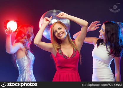 party, &quot;new year&quot;, celebration, friends, bachelorette party, birthday concept - three beautiful women in evening dresses dancing in the club