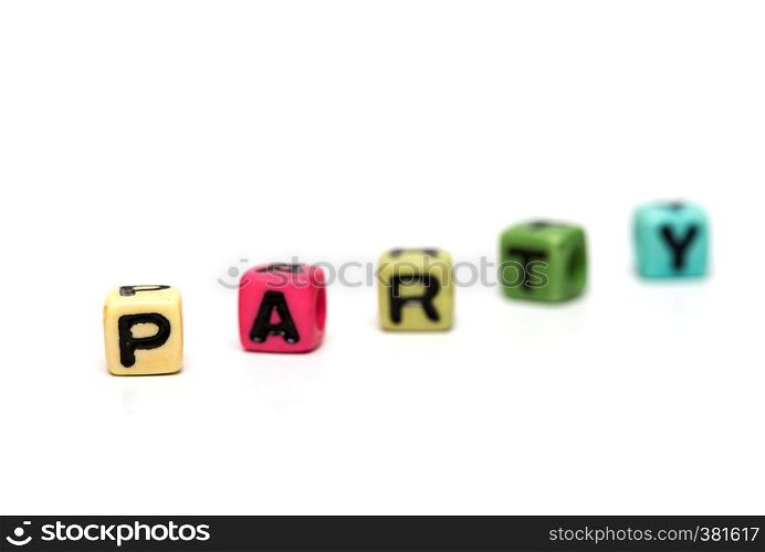 party - word made from multicolored child toy cubes with letters
