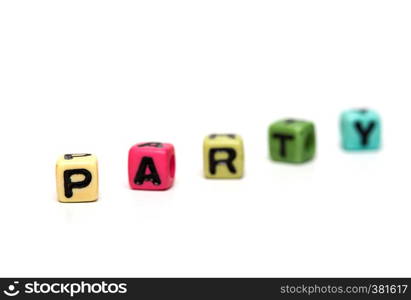 party - word made from multicolored child toy cubes with letters