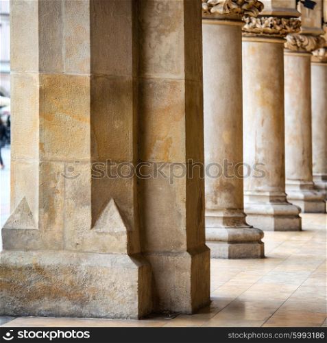 Passage of the gothic hall with columns. Main market square in Krakow city, Poland