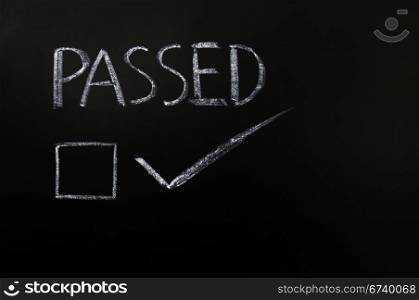 Passed with a check box drawn in chalk on a blackboard