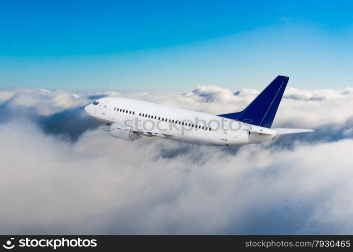 Passenger airliner flight in the blue sky