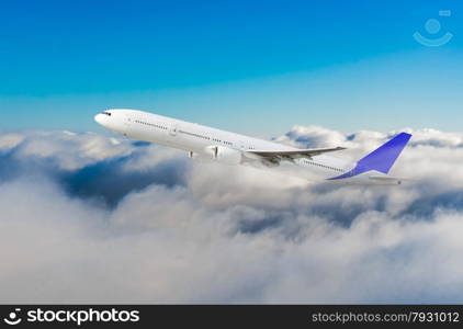 Passenger airliner flight in the blue sky