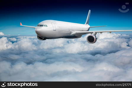 Passenger Airliner flying in the clouds