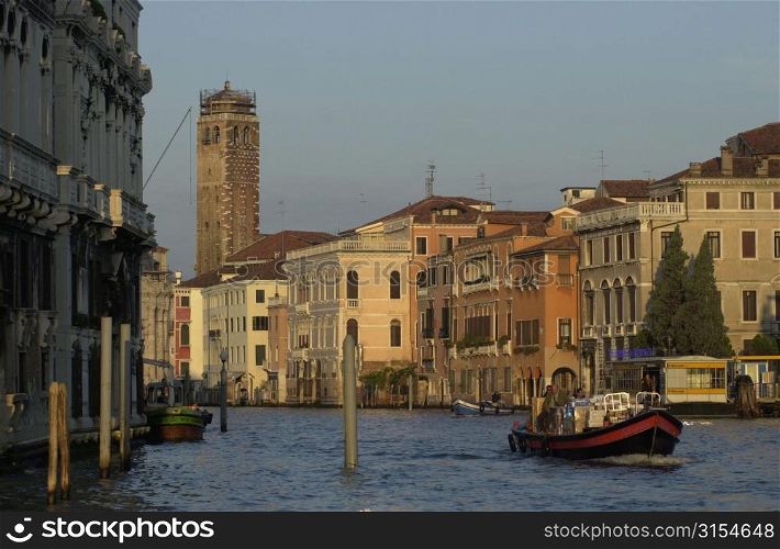 Passenger boat in a canal in Venice, Italy