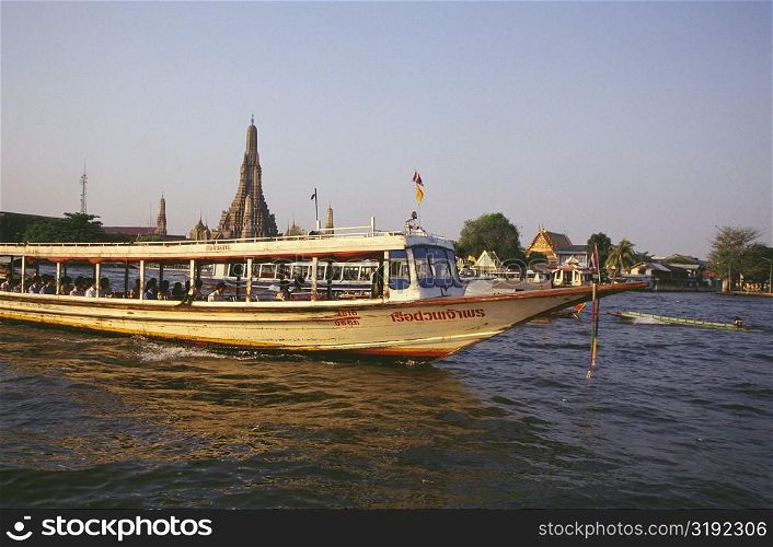 Passenger craft in a river, Chao phraya river, Bangkok, Thailand