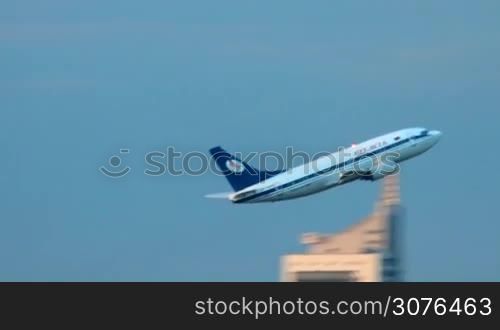 passenger plane takeoff in the city