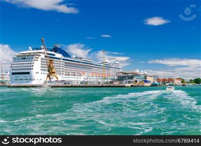 Passenger ships moored to the pier in the sea passenger port. Venice. Italy.. Venice. Sea passenger port.