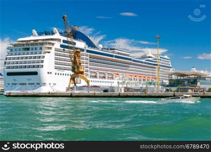 Passenger ships moored to the pier in the sea passenger port. Venice. Italy.. Venice. Sea passenger port.