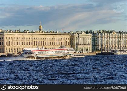 "Passenger speedboat hydrofoil "Meteor" on the river Neva near the Winter Palace (Hermitage Museum) in St. Petersburg, Russia"