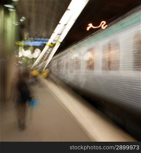 Passengers at a subway station, Stockholm, Sweden